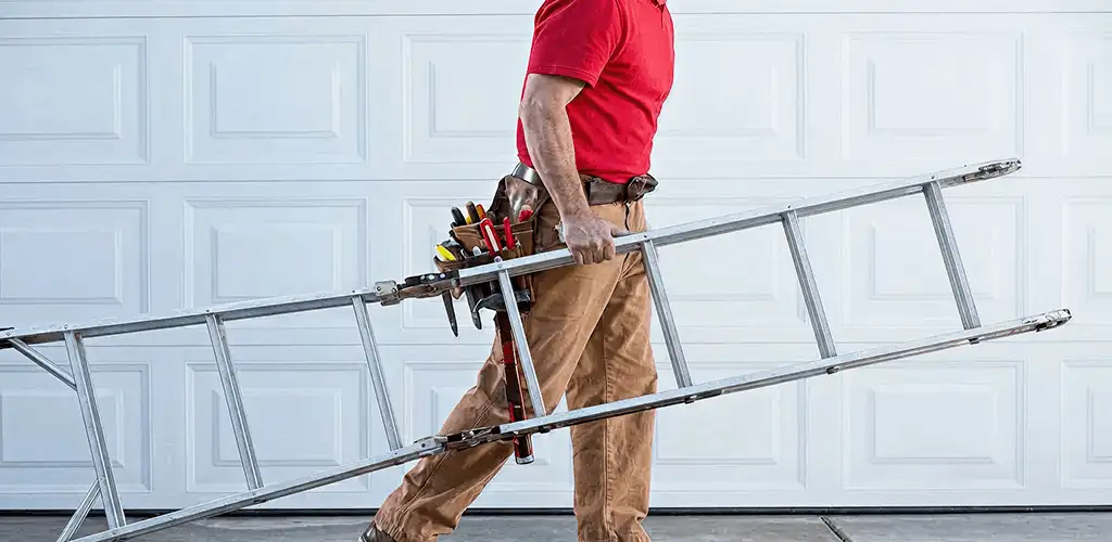 Garage door repair technician arriving with tools and ladder in Phoenix, AZ