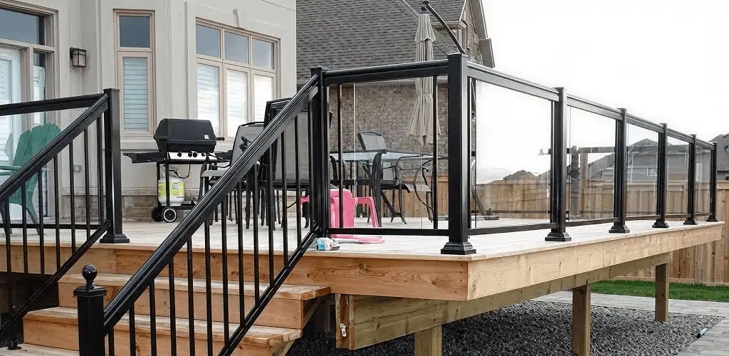 Handrail installation on a deck staircase for safety and code compliance in Phoenix, AZ