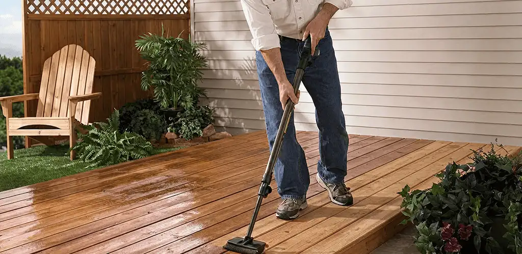 Deck staining service applying stain to a backyard wood deck in Phoenix, AZ